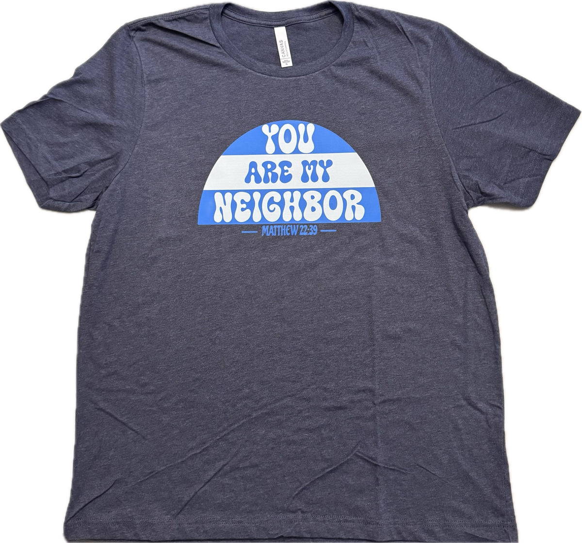 You Are My Neighbor Matthew 22:39 blue and white design on BELLA+CANVAS 3001CVC Heather Midnight Navy tee