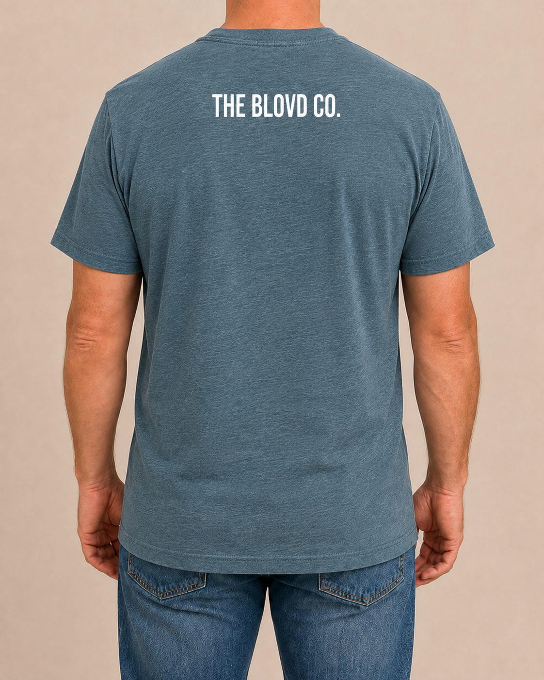 THE BLOVD Lion Classic on Bella+Canvas 3001CVC Heather Deep Teal with True White upper-back mark, male rear view
