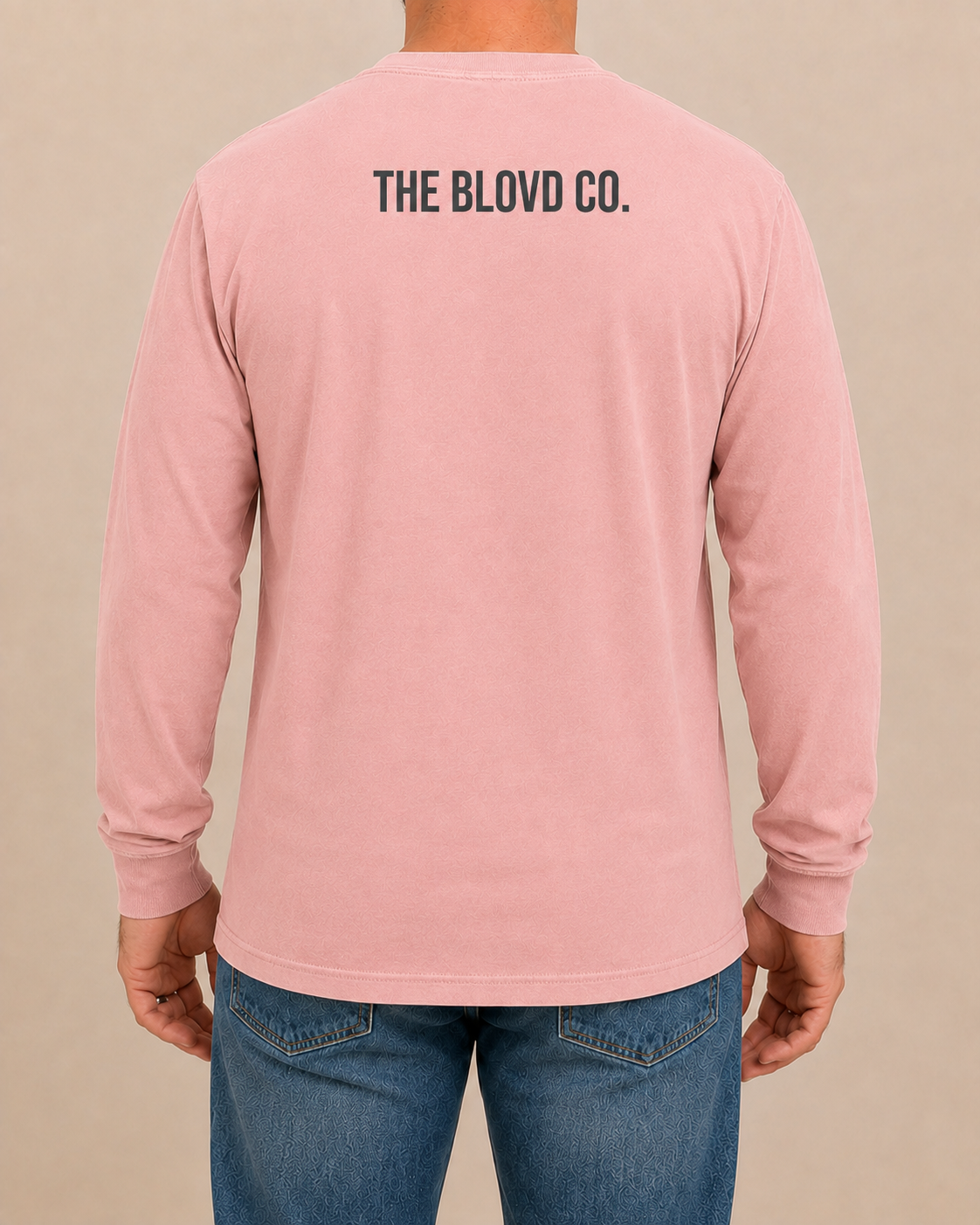 THE BLOVD Lion Classic Comfort Colors 6014 Blossom long sleeve with Deep Charcoal THE BLOVD CO. upper-back mark, approved male rear studio view