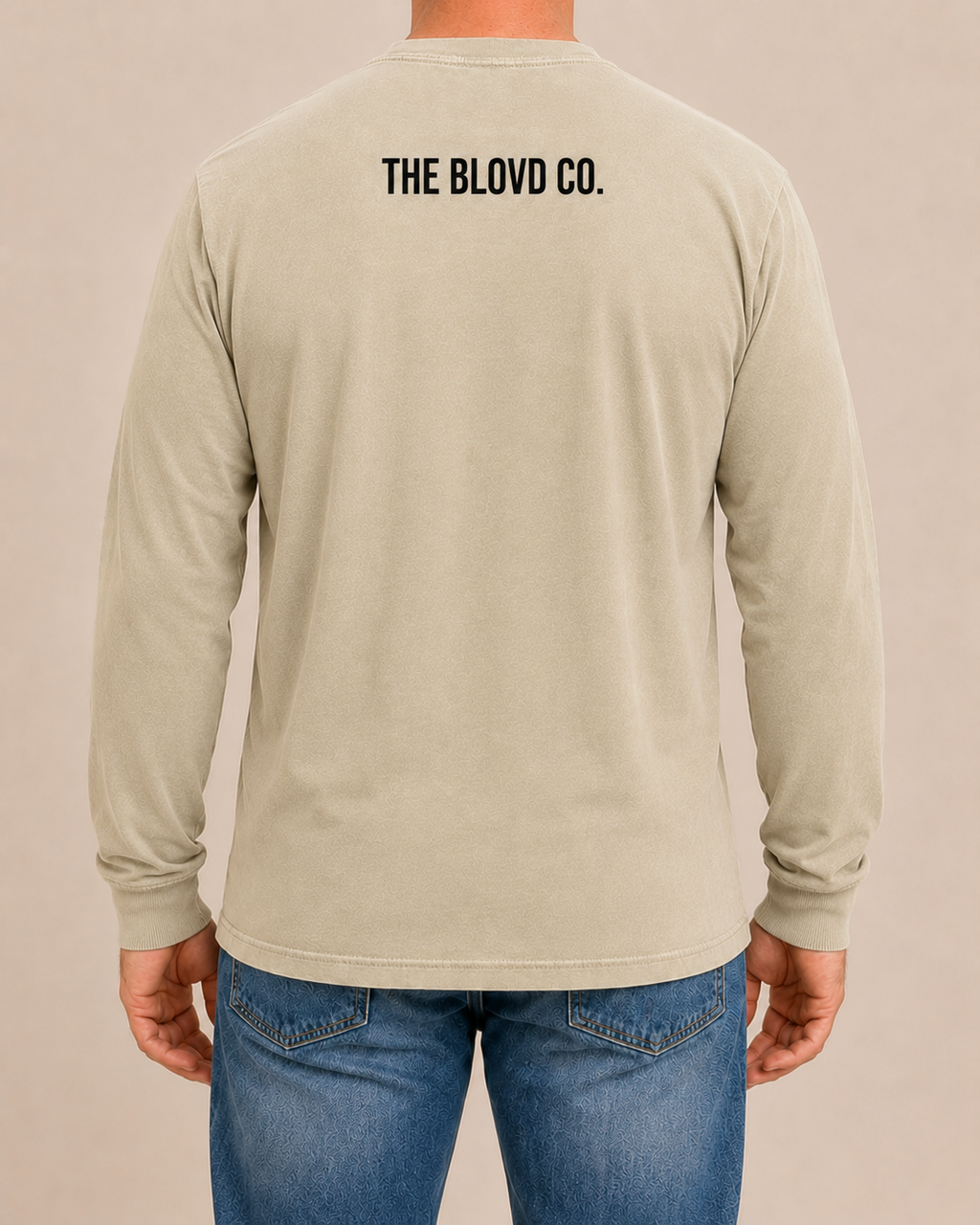 THE BLOVD Lion Classic Comfort Colors 6014 Sandstone long sleeve with black THE BLOVD CO. upper-back mark, approved male rear studio view