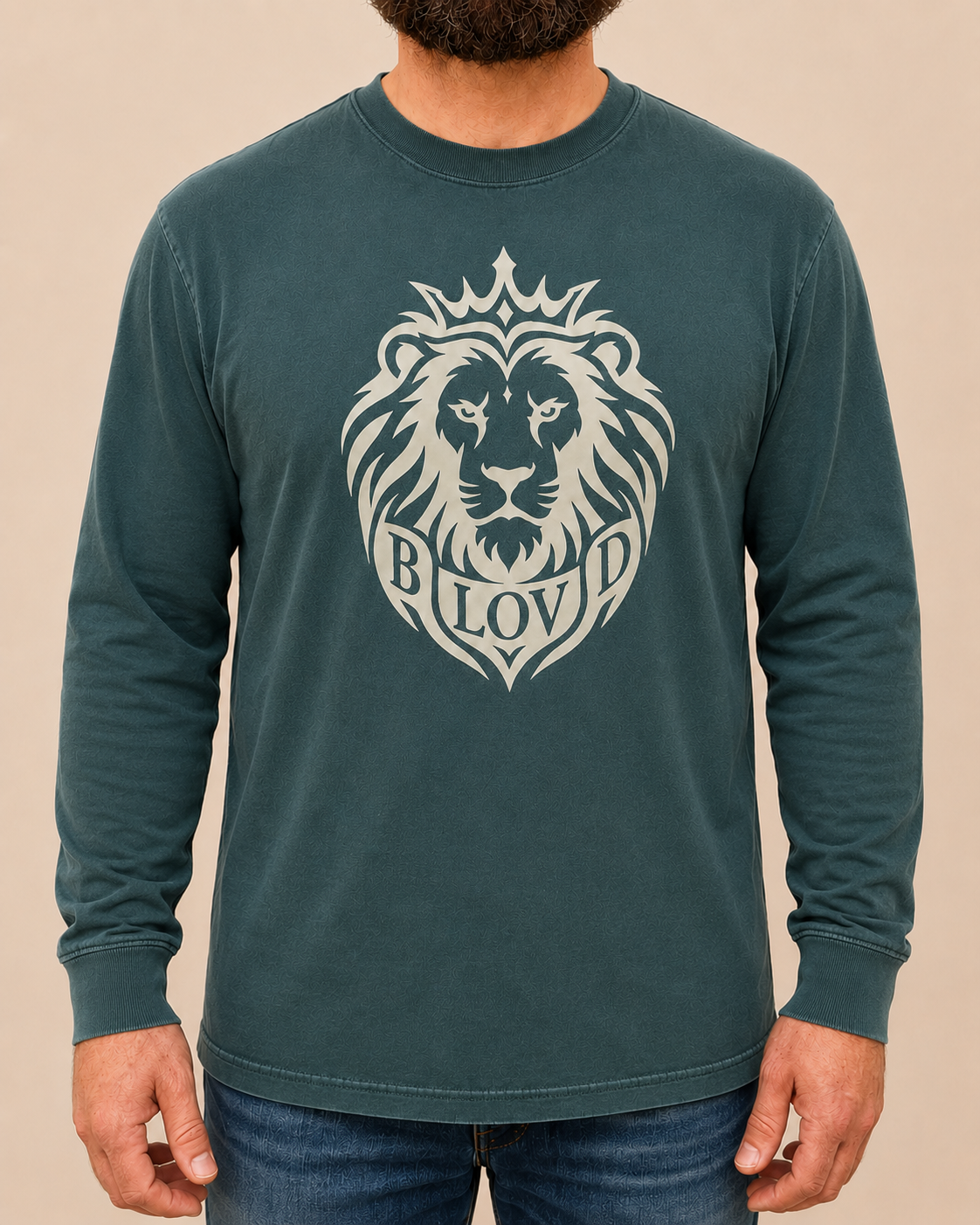 THE BLOVD Lion Signature Comfort Colors 6014 Blue Spruce long sleeve with Soft Linen Lion artwork, approved male front studio view