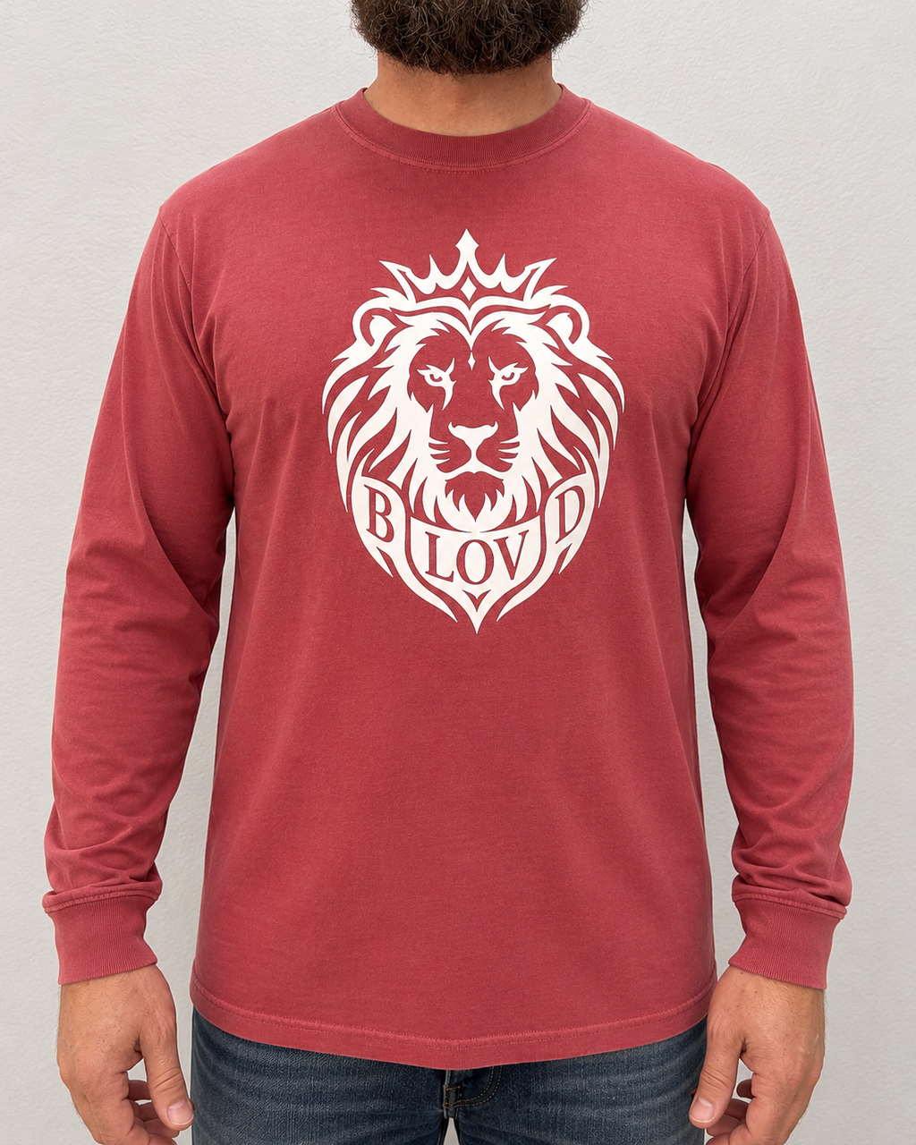 THE BLOVD Lion Signature Comfort Colors 6014 Crimson long sleeve with white Lion artwork, approved tightly cropped male front studio view