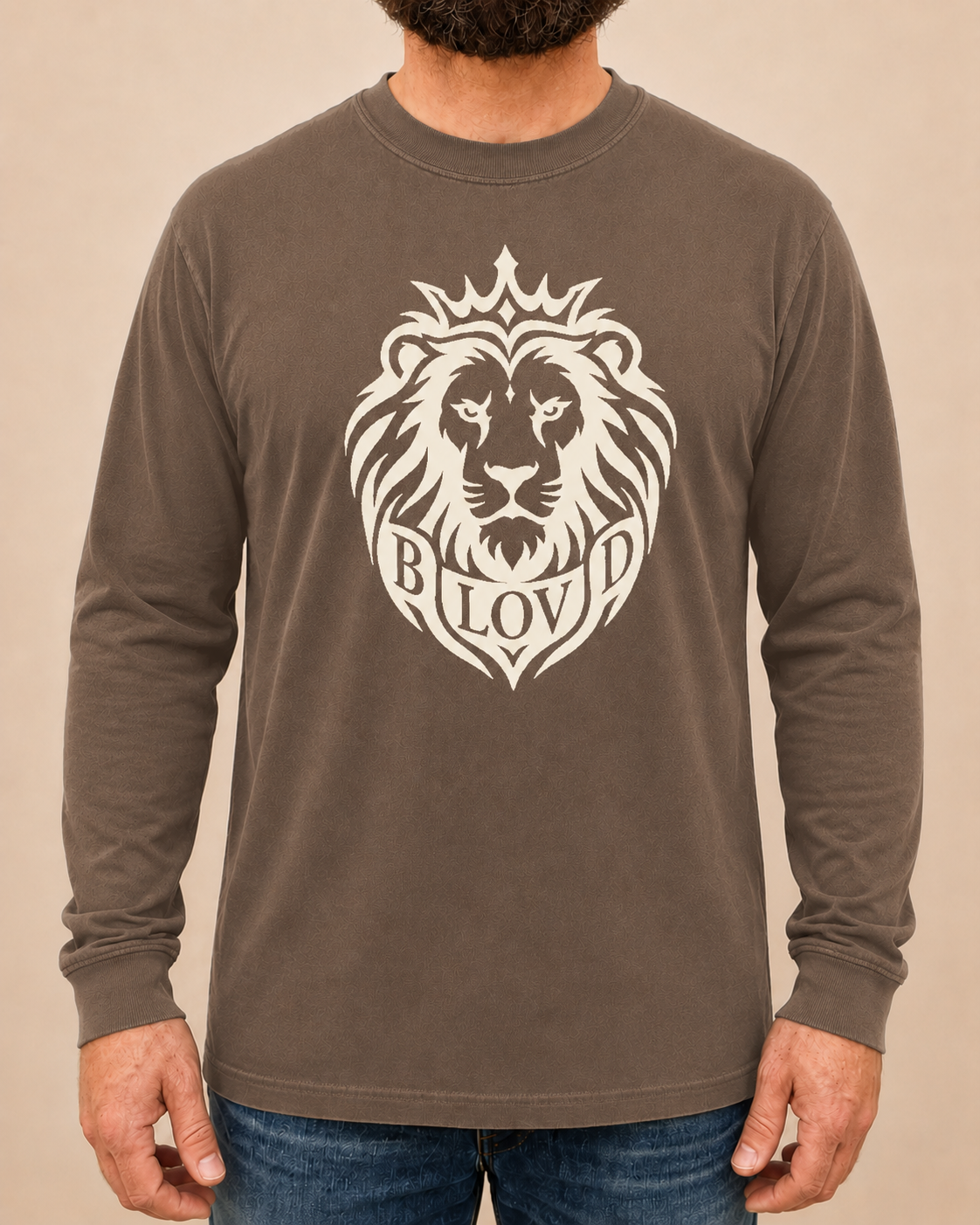 THE BLOVD Lion Signature Comfort Colors 6014 Espresso long sleeve with Warm Ivory Lion artwork, approved male front studio view