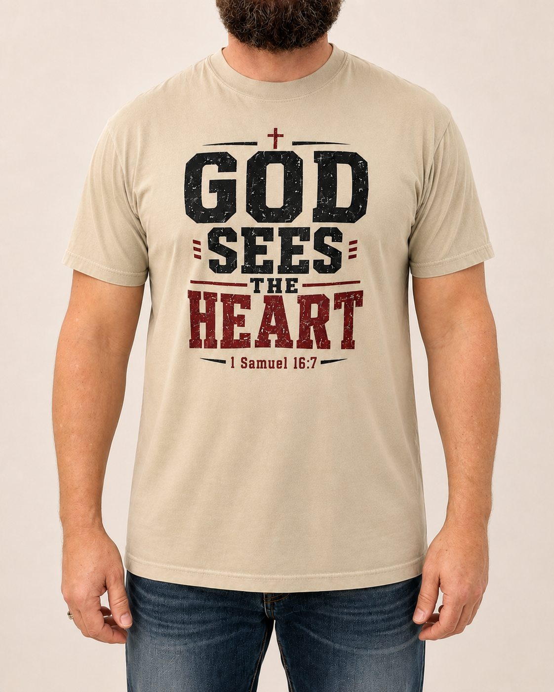 God Sees the Heart Sandstone Comfort Colors tee, male warm-neutral studio front view with beard-only catalog crop