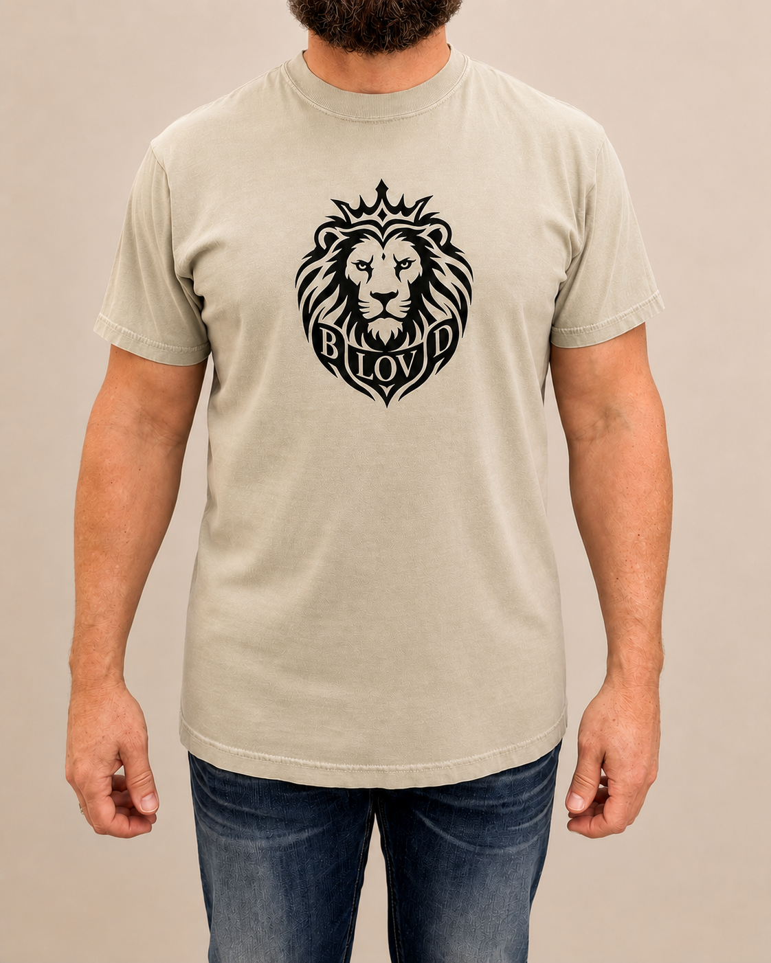 THE BLOVD Lion Classic Sandstone Comfort Colors T-shirt with black Lion artwork, approved male warm-neutral studio front view