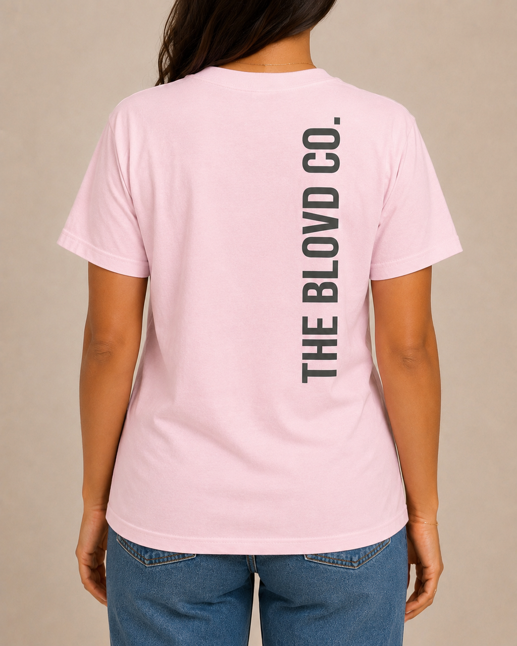 THE BLOVD Lion Signature Blossom T-shirt with Deep Charcoal vertical back wordmark, approved matching female studio back view