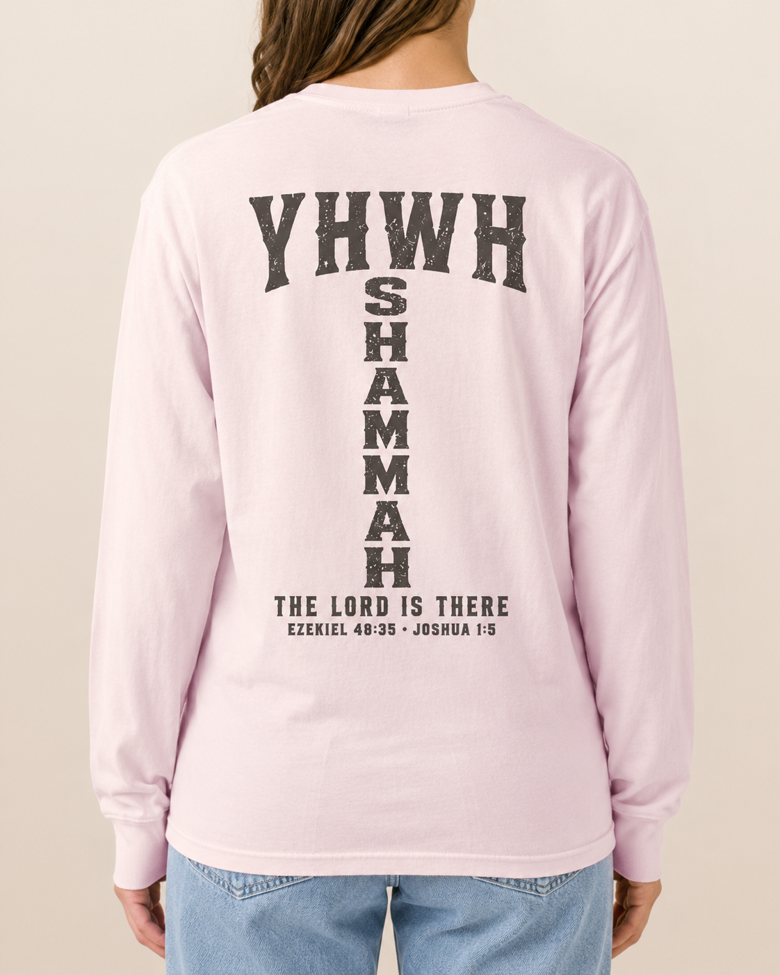 YHWH SHAMMAH Comfort Colors 6014 Blossom long sleeve, Weathered Espresso back artwork, approved lighter Blossom female studio rear view