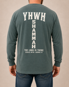 YHWH SHAMMAH | The Lord Is There Blue Spruce Comfort Colors 6014 long-sleeve shirt with Soft Linen back artwork, modeled back view
