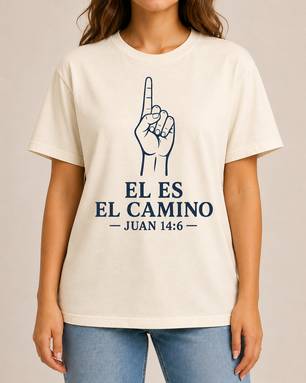 Female model, straight-on front view, wearing Bella+Canvas Natural Él Es el Camino shirt with BLOVD Heritage Navy artwork.