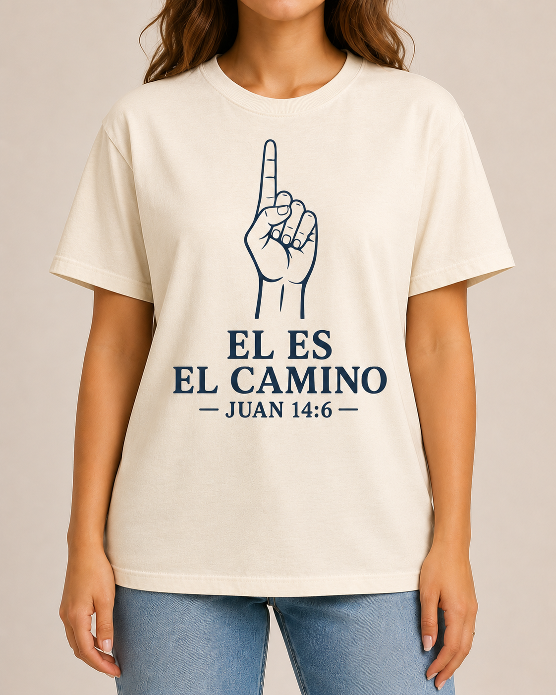 Female model, straight-on front view, wearing Bella+Canvas Natural Él Es el Camino shirt with BLOVD Heritage Navy artwork.